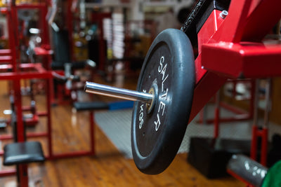 Why Weight Plates Are Crucial for Progressive Strength Training