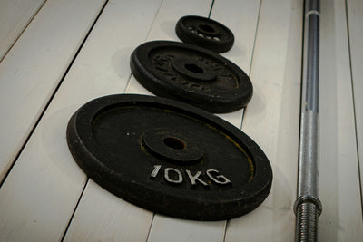 Why Olympic Plates Weight Matters for Strength Progress