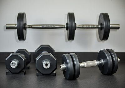 Dumbbells vs. Barbells: Pros for UK Home Gyms