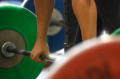 Why Olympic Weight Plates Are Better for Compound Moves