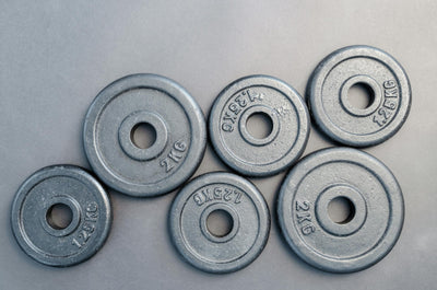Olympic Plates That Fit Best in Small Garage Gyms